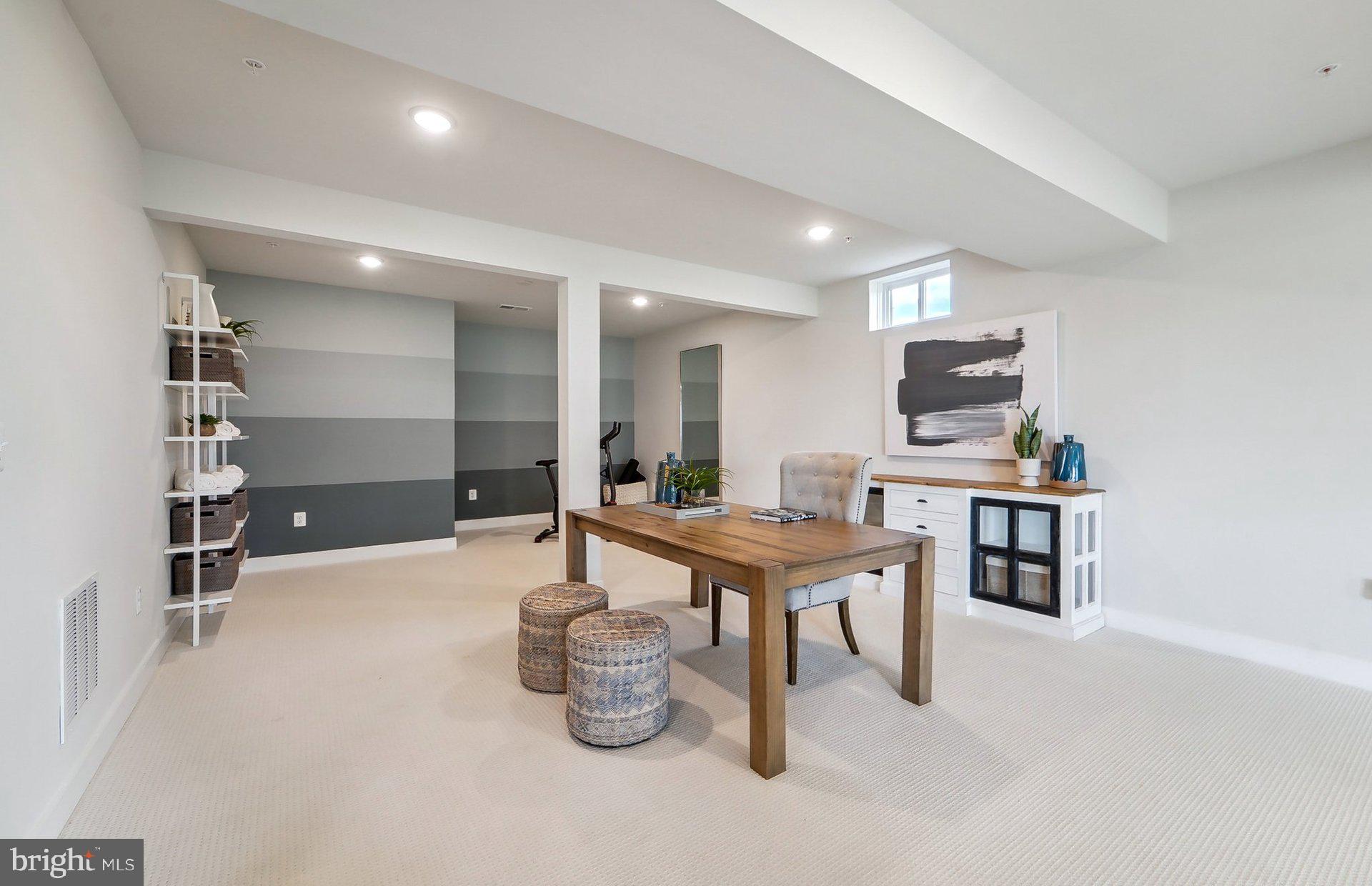 22512 Sculpin Brk Road Boyds, MD 20841 - Photo 39 of 69 a living room with furniture a piano and a flat screen tv