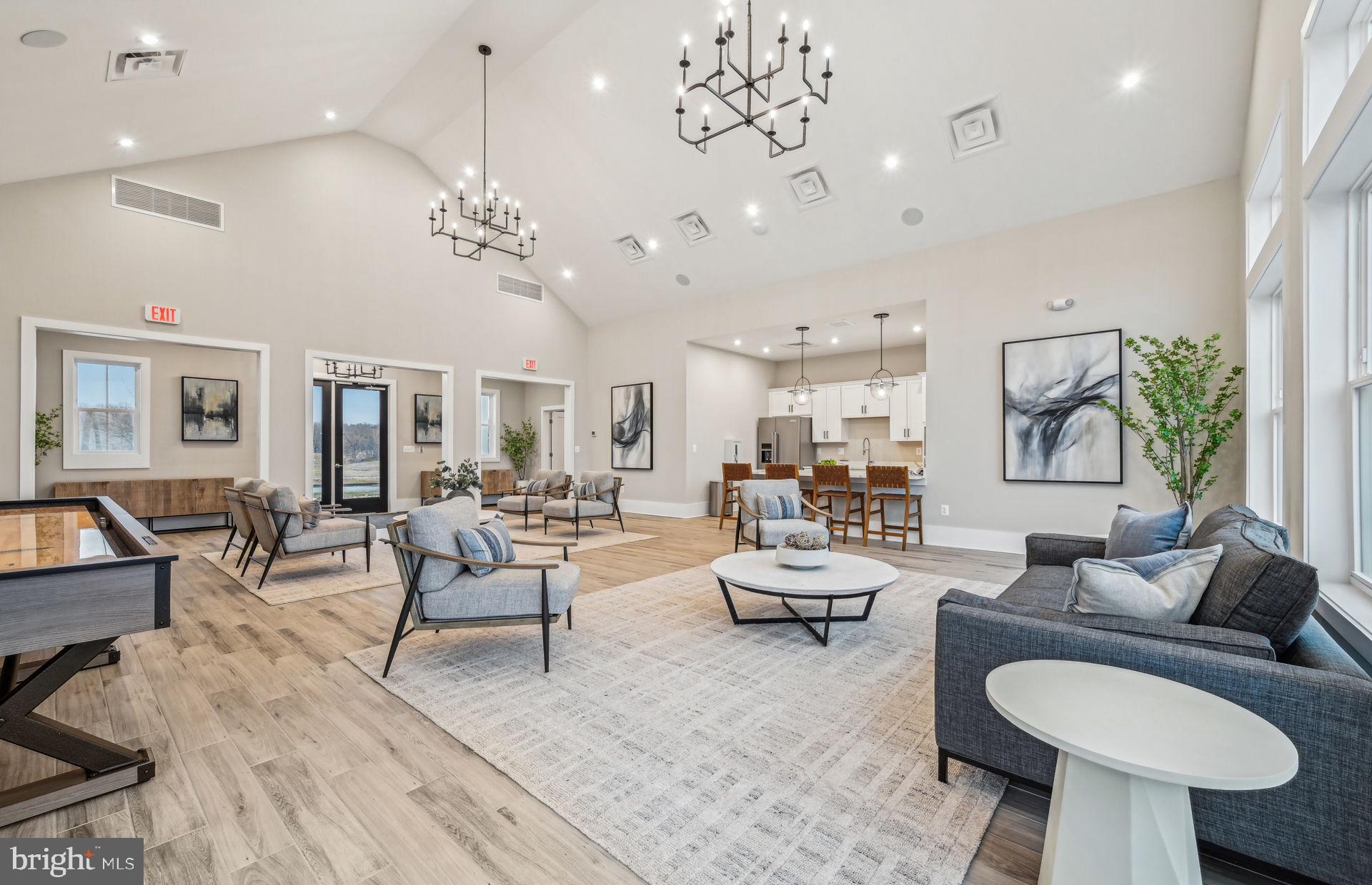 22512 Sculpin Brk Road Boyds, MD 20841 - Photo 63 of 69 a living room with furniture or chandelier and a wooden floor
