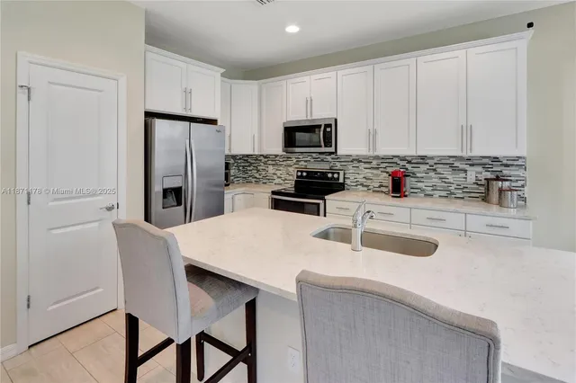 $860,000 | 4353 Large Leaf Lane, Hollywood, FL 33021