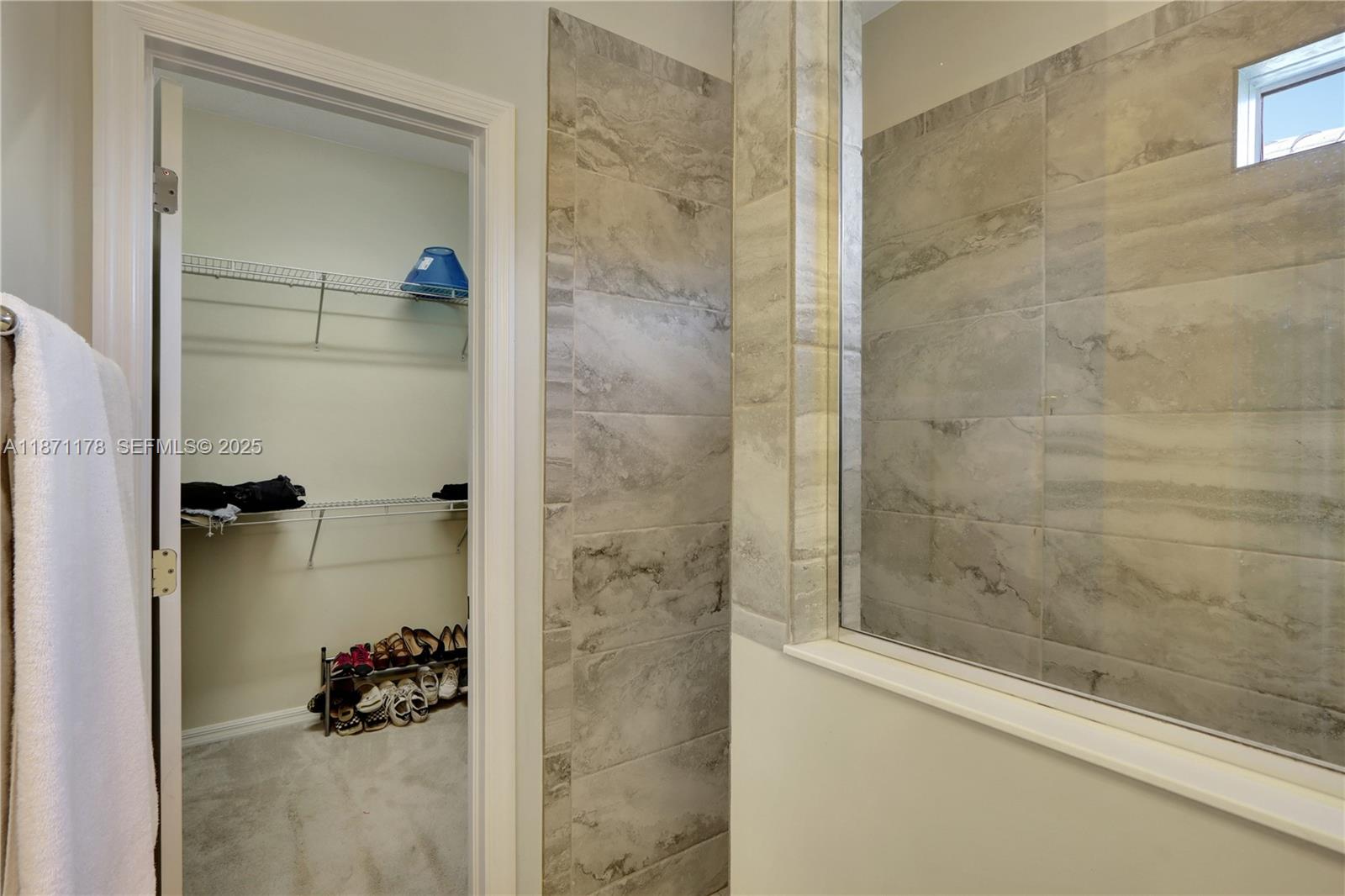 4353 Large Leaf Lane Hollywood, FL 33021 - Photo 21 of 31 a bathroom with a glass shower door