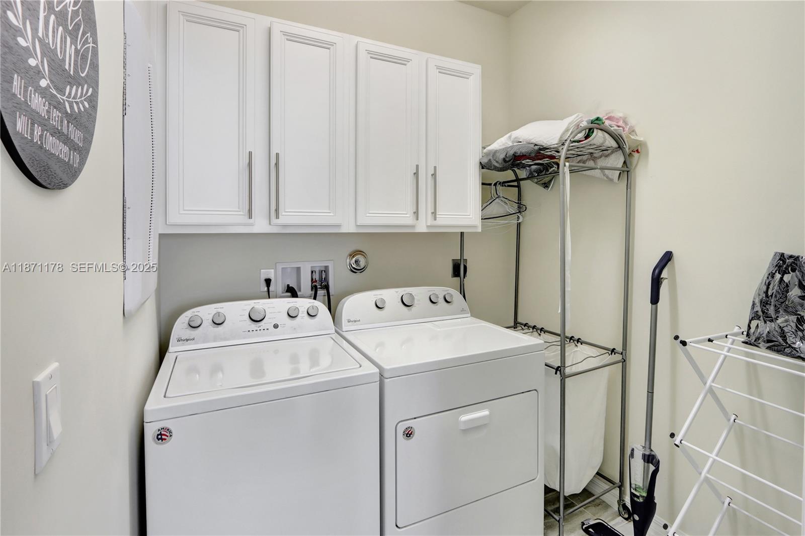 4353 Large Leaf Lane Hollywood, FL 33021 - Photo 29 of 31 a view of bathroom with a washer and dryer
