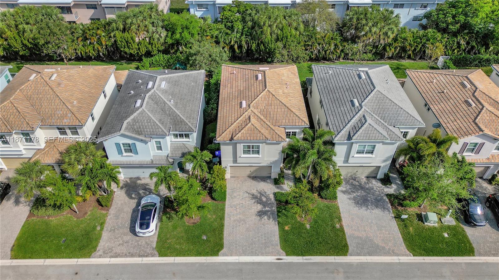 4353 Large Leaf Lane Hollywood, FL 33021 - Photo 3 of 31 an aerial view of a house with a yard