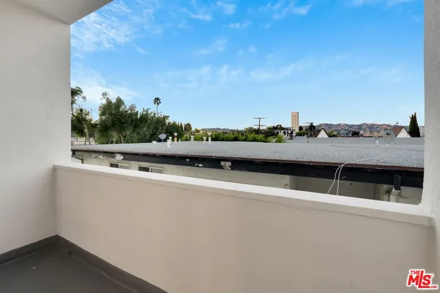 a view of car parked on the road