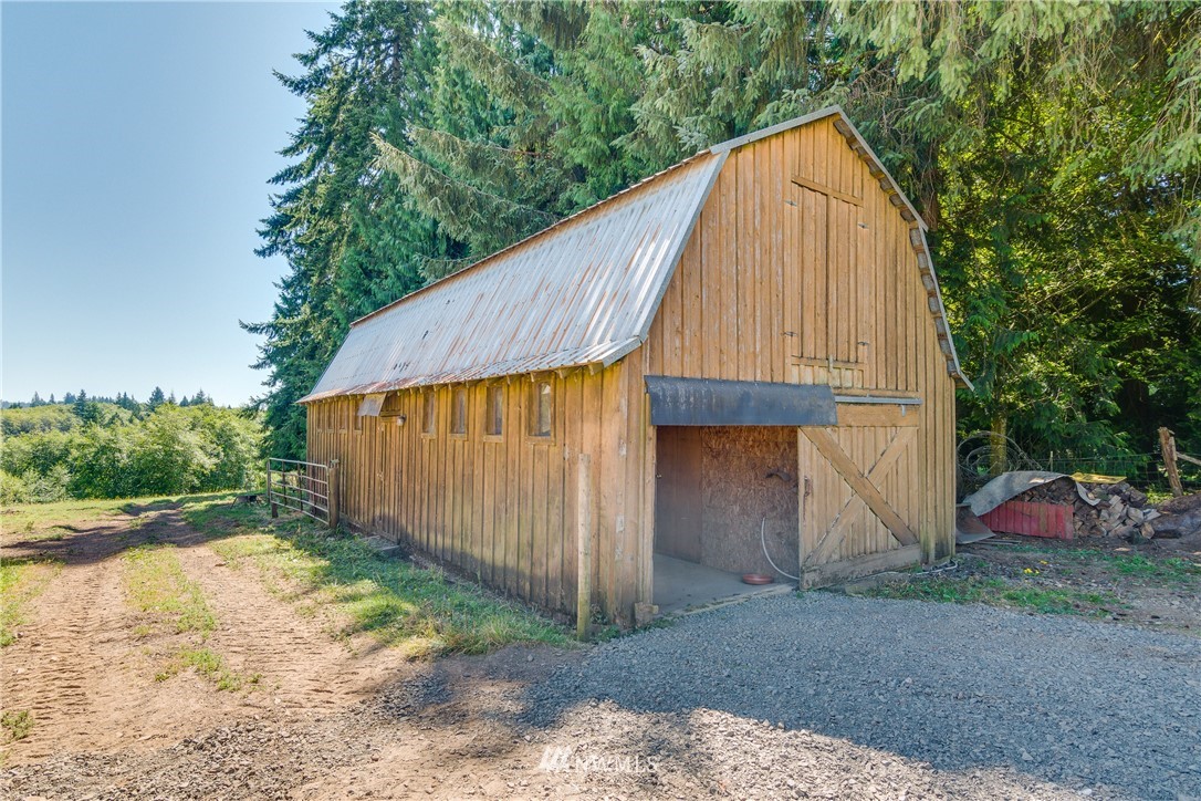 340 Bunker Hill Road Longview, WA 98632 - Photo 27 of 35 a view of backyard with small cabin