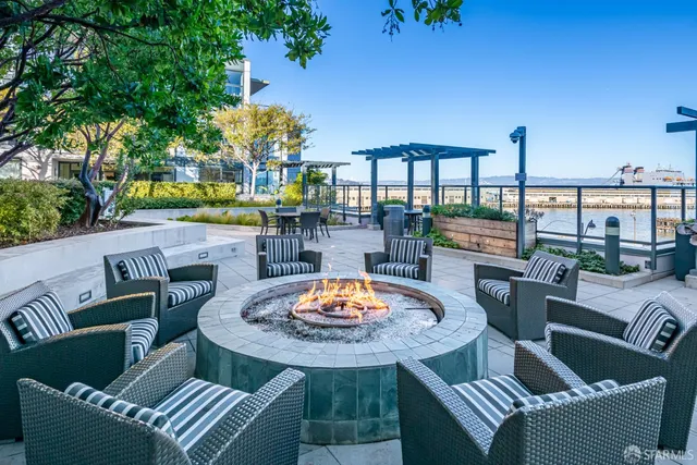 a outdoor living space with furniture and a potted plant