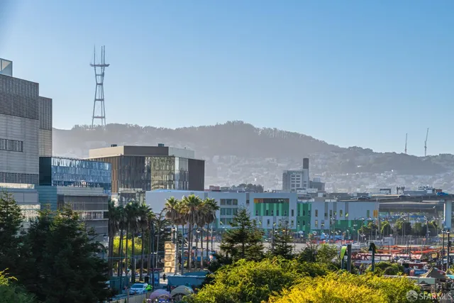 a view of a city and a building in the background
