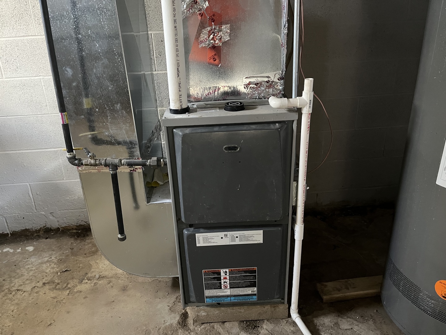1351 4483rd Road Earlville, IL 60518 - Photo 22 of 30 a room with water heater and a cabinet