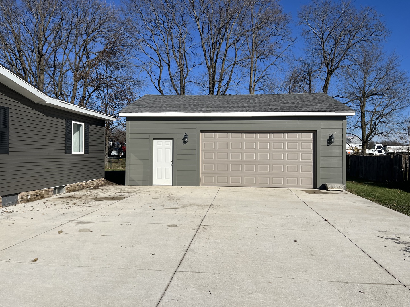 1351 4483rd Road Earlville, IL 60518 - Photo 27 of 30 a front view of a house with a yard and garage
