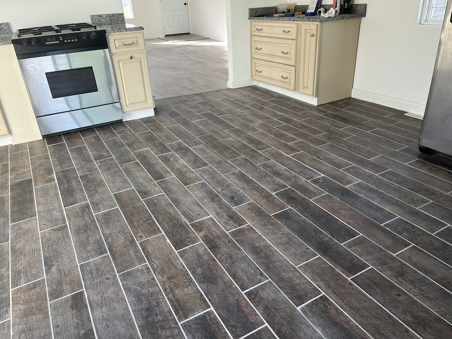 1351 4483rd Road Earlville, IL 60518 - Photo 5 of 30 a kitchen with granite countertop white cabinets and white appliances