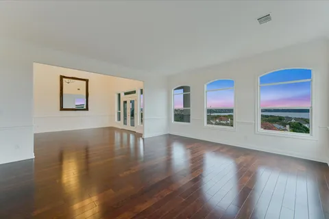 a view of livingroom with furniture wooden floor and window