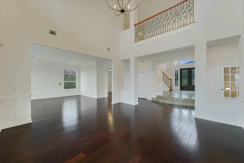 a view of a livingroom with wooden floor
