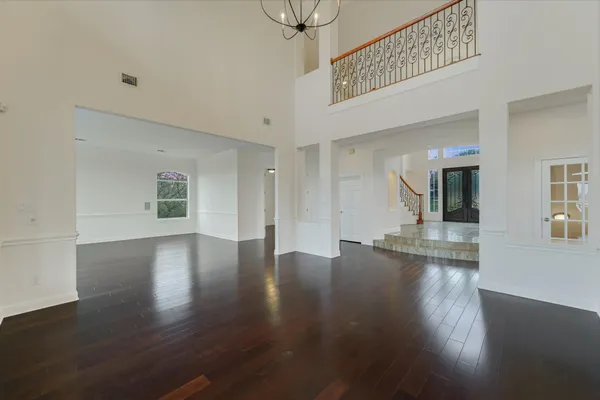 a view of a livingroom with wooden floor
