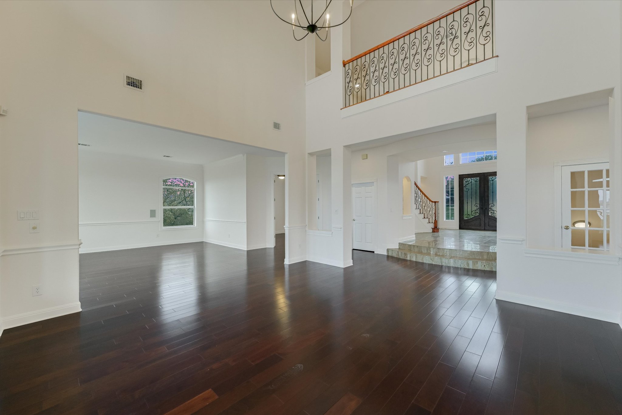 4319 Rum Runner Road Austin, TX 78734 - Photo 14 of 40 a view of a livingroom with wooden floor