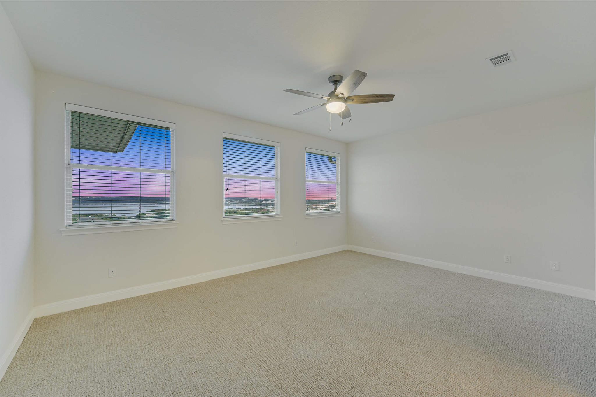 4319 Rum Runner Road Austin, TX 78734 - Photo 23 of 40 Upstairs Bedroom with huge views of Lake Travis