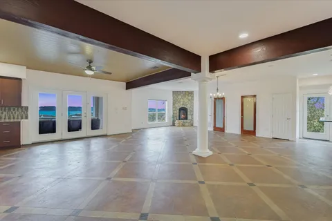 a view interior of a building with glass door and windows
