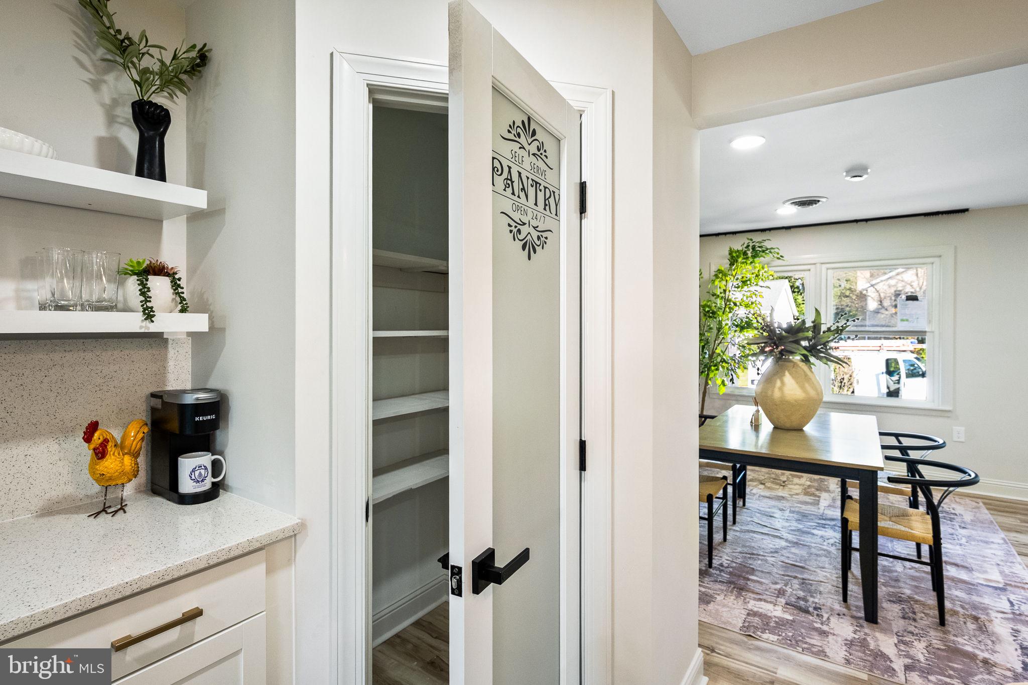 178 Fulton Avenue Charles Town, WV 25414 - Photo 11 of 30 a view of a workspace living room with furniture and a potted plant