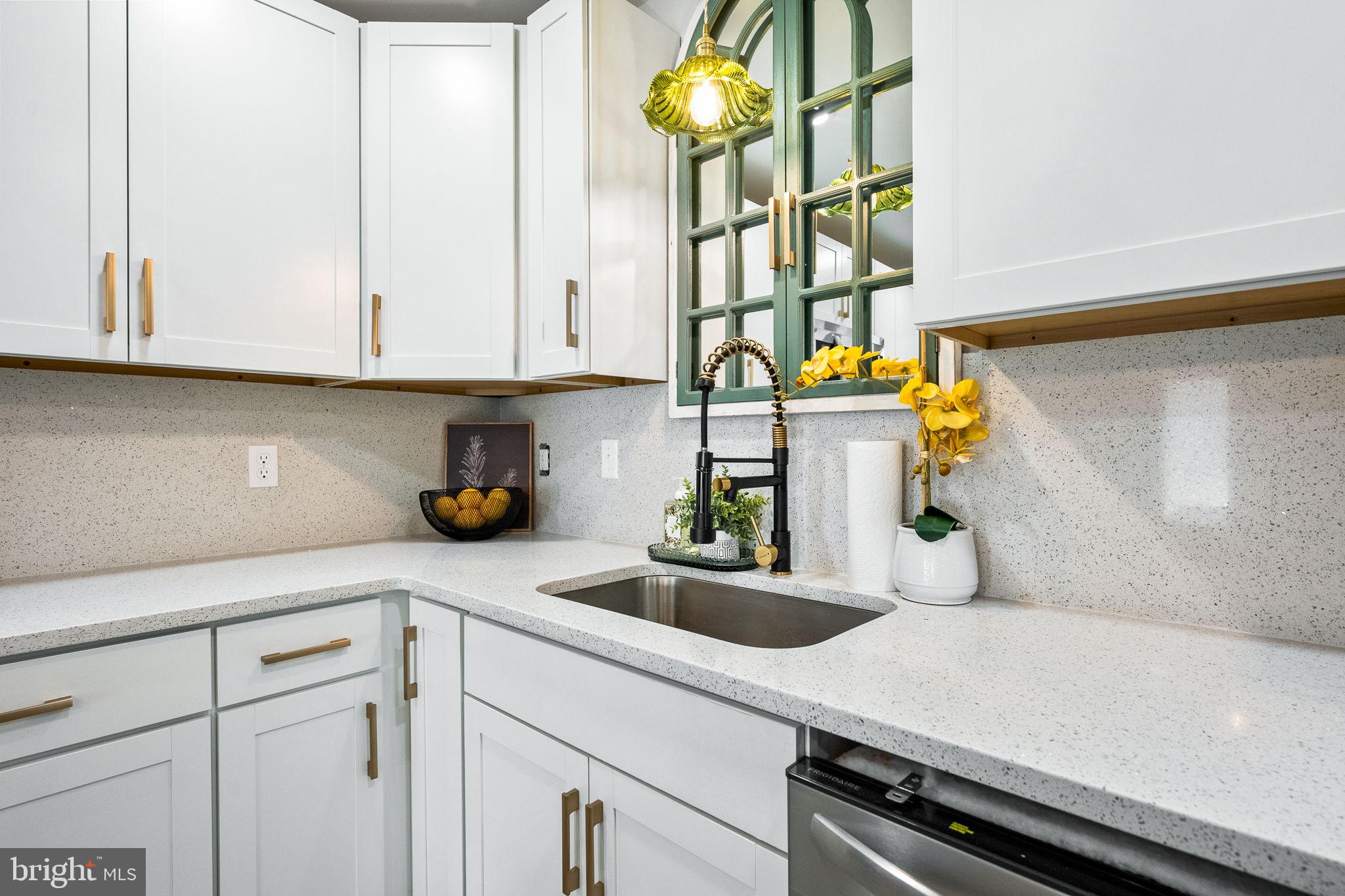 178 Fulton Avenue Charles Town, WV 25414 - Photo 12 of 30 a kitchen with a sink and cabinets