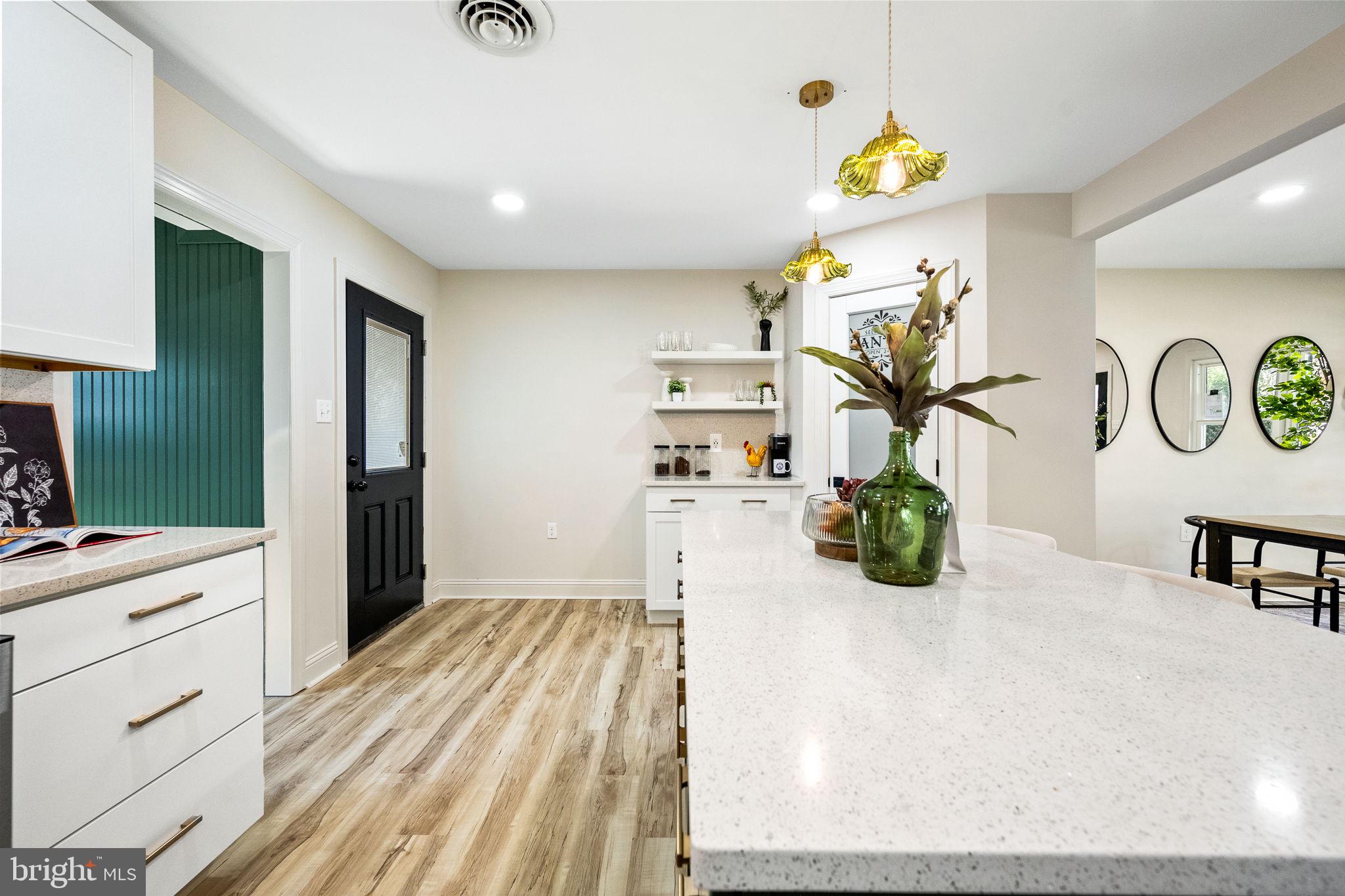 178 Fulton Avenue Charles Town, WV 25414 - Photo 13 of 30 a spacious bathroom with a sink a mirror and shower