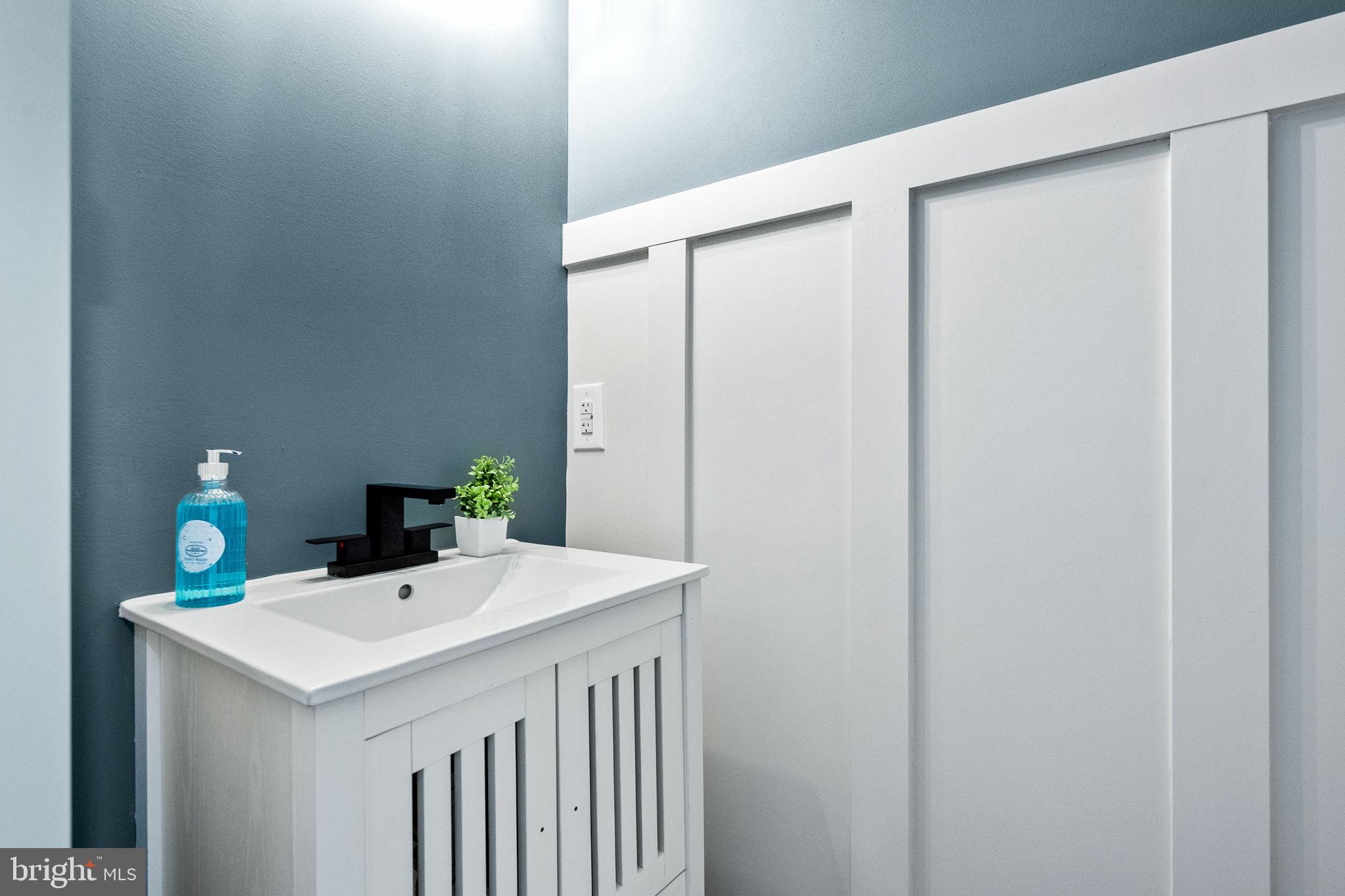 178 Fulton Avenue Charles Town, WV 25414 - Photo 19 of 30 a bathroom with a sink and a mirror