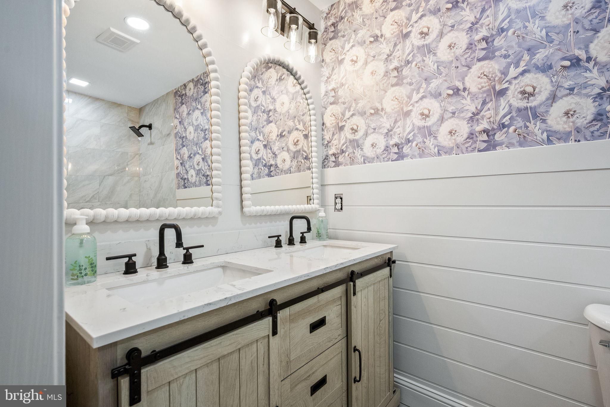 178 Fulton Avenue Charles Town, WV 25414 - Photo 21 of 30 a bathroom with a sink and a mirror