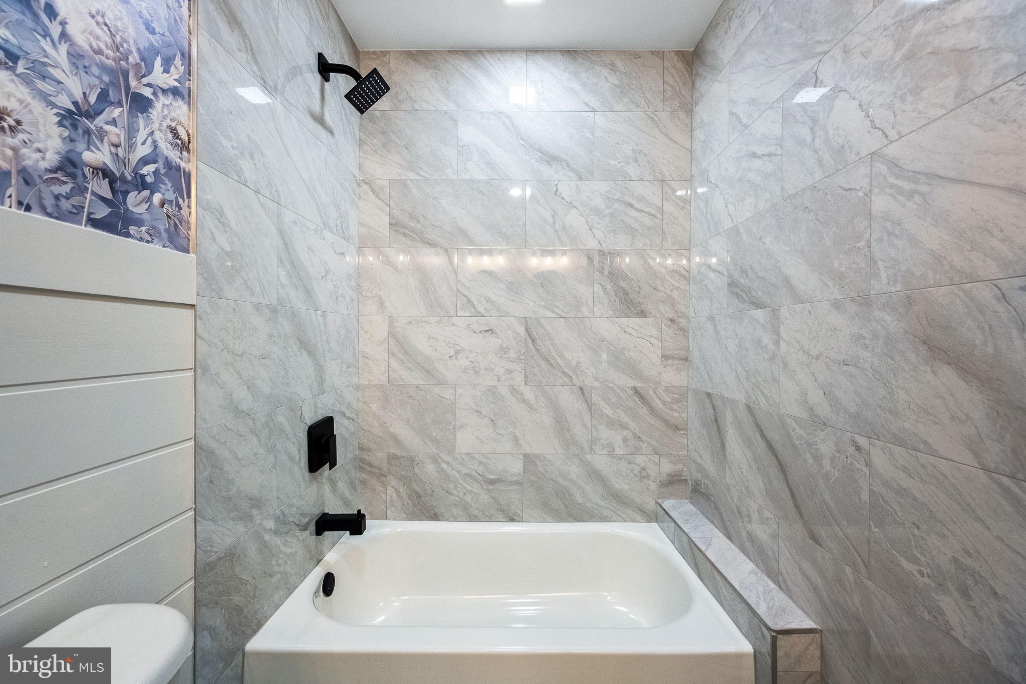 178 Fulton Avenue Charles Town, WV 25414 - Photo 22 of 30 a bathroom with a bathtub