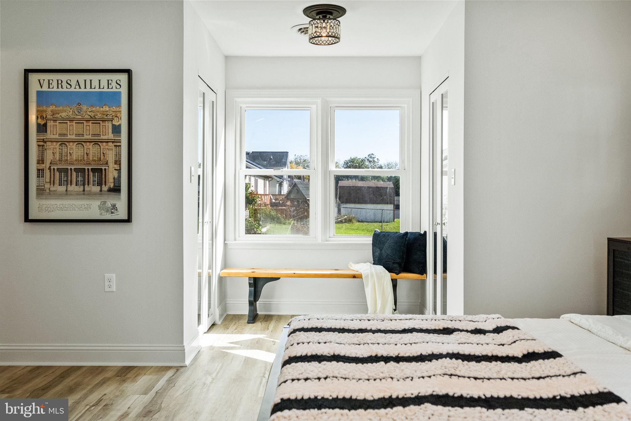 178 Fulton Avenue Charles Town, WV 25414 - Photo 25 of 30 a bedroom with a large bed and a window