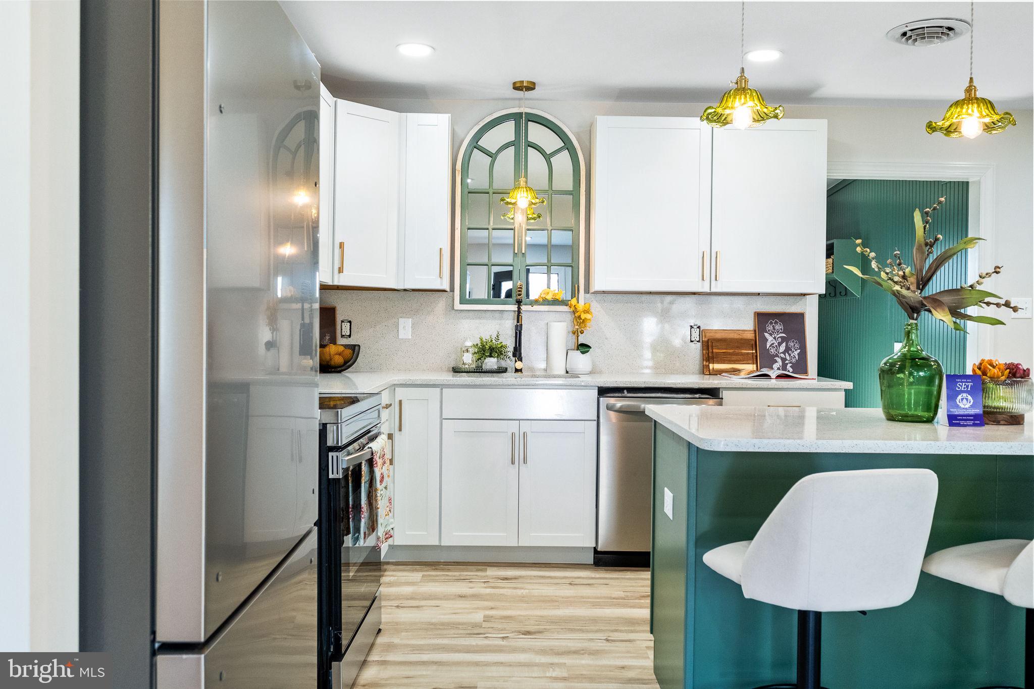 178 Fulton Avenue Charles Town, WV 25414 - Photo 29 of 30 a kitchen with a sink cabinets and a window
