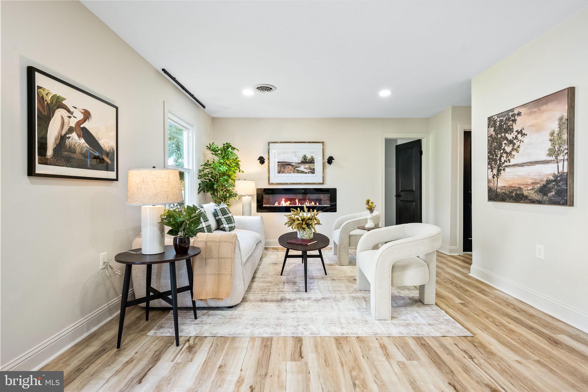 178 Fulton Avenue Charles Town, WV 25414 - Photo 6 of 30 a living room with furniture and wooden floor