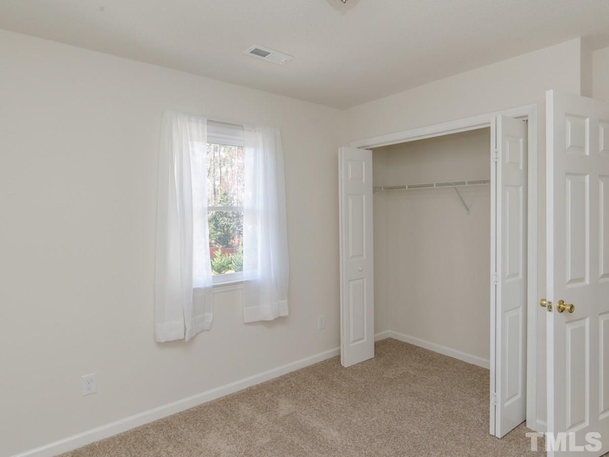 4024 Iron Horse Road Raleigh, NC 27616 - Photo 16 of 25 a view of an empty room with a window