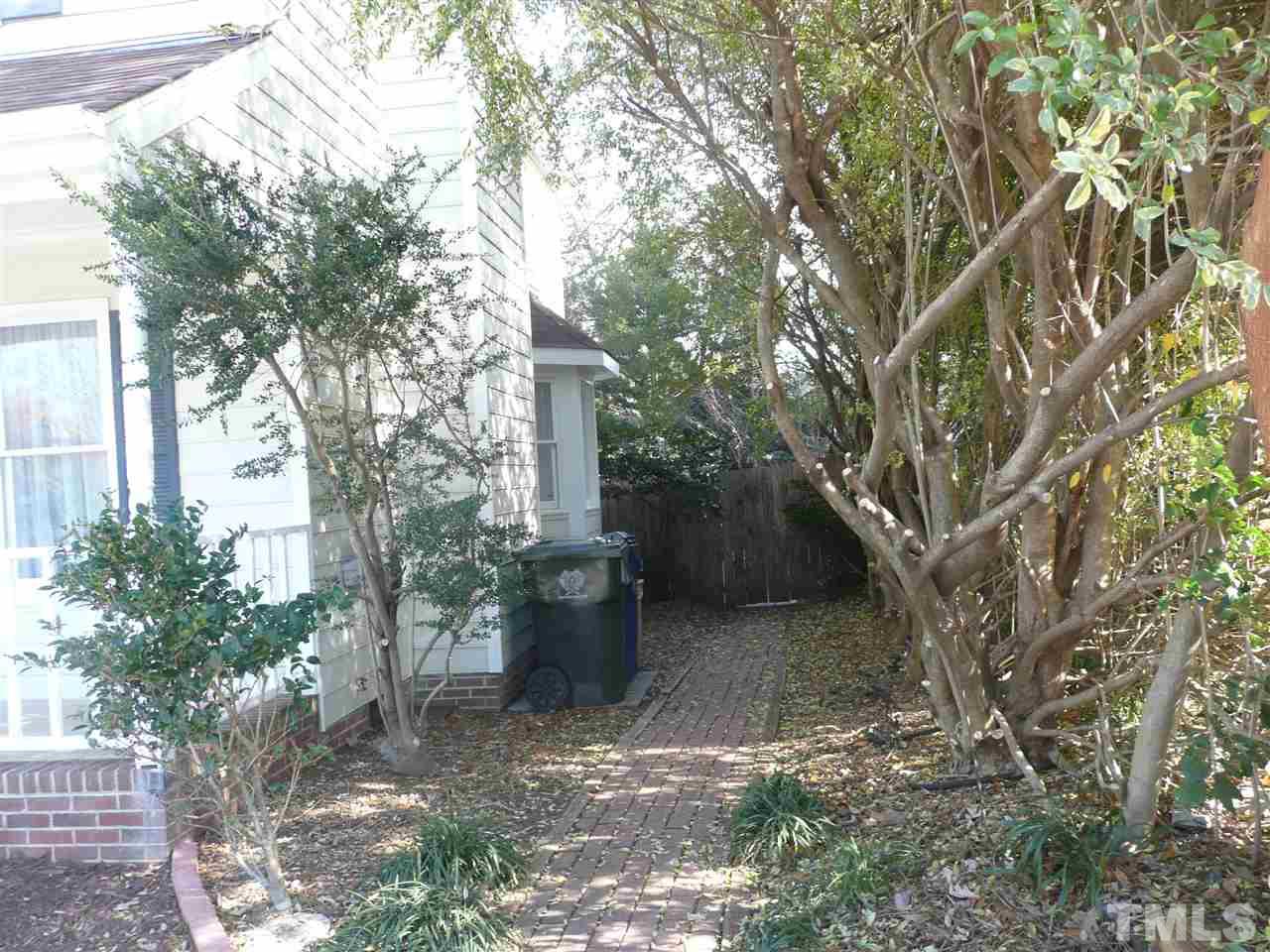 4024 Iron Horse Road Raleigh, NC 27616 - Photo 20 of 25 a view of a yard with plants and trees
