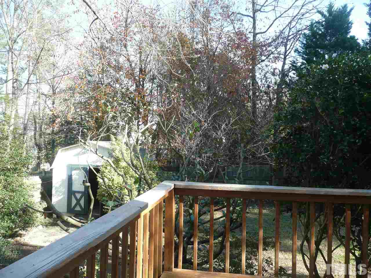 4024 Iron Horse Road Raleigh, NC 27616 - Photo 22 of 25 a view of a balcony with wooden floor and fence