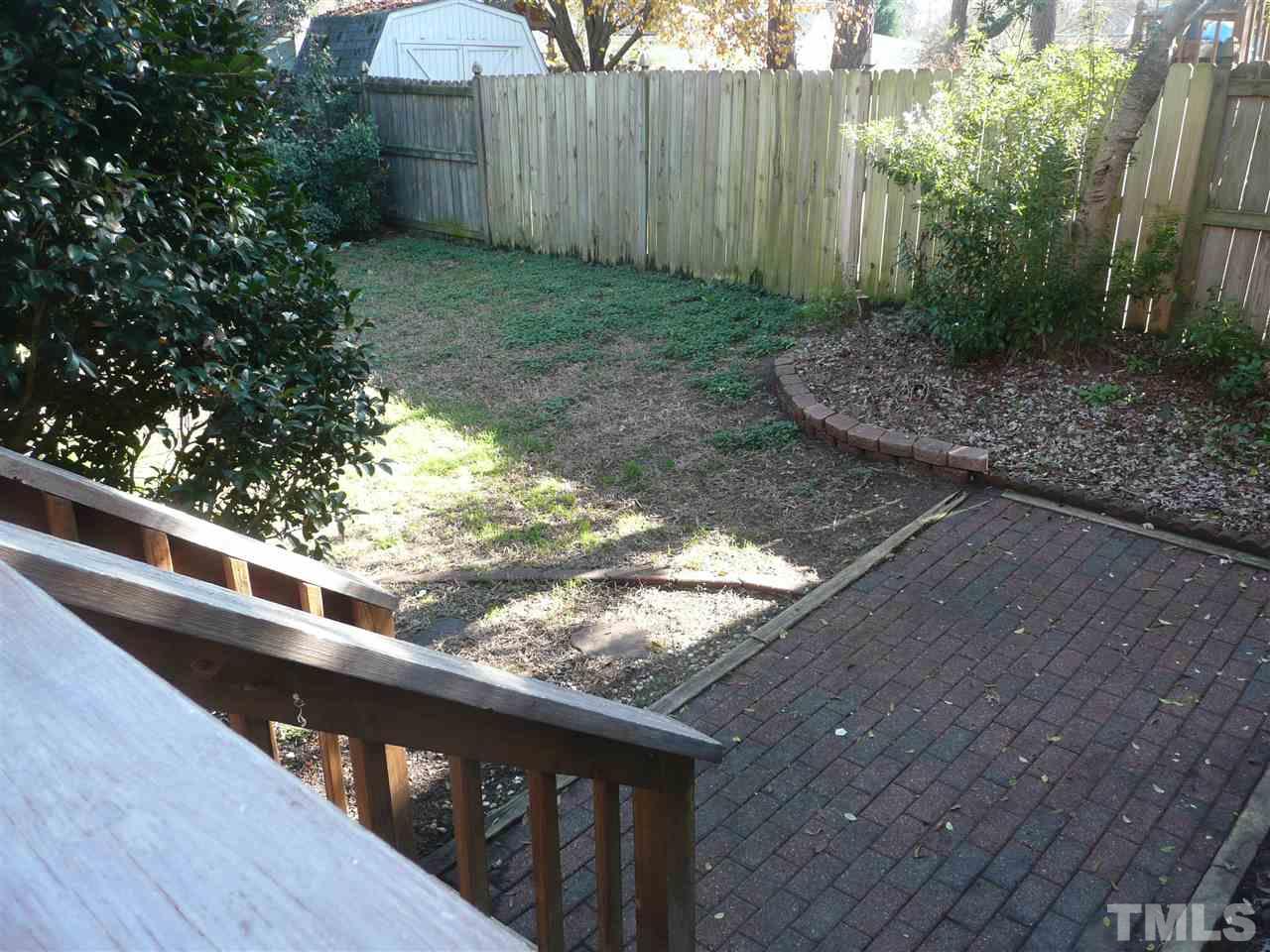 4024 Iron Horse Road Raleigh, NC 27616 - Photo 25 of 25 a view of a wooden fence next to a yard