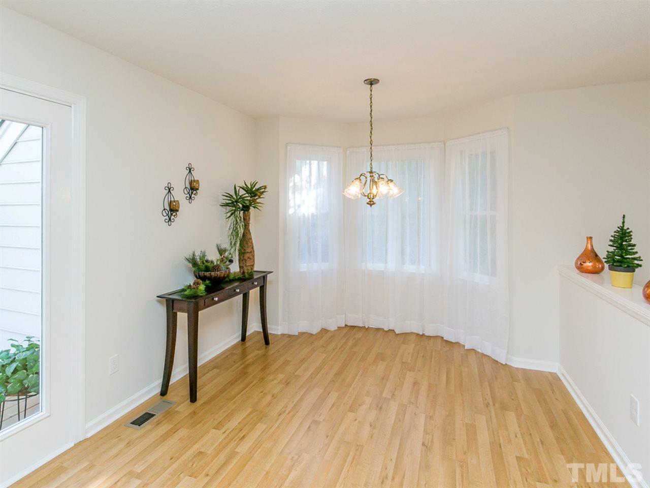 4024 Iron Horse Road Raleigh, NC 27616 - Photo 10 of 25 a view of empty room with wooden floor and fan