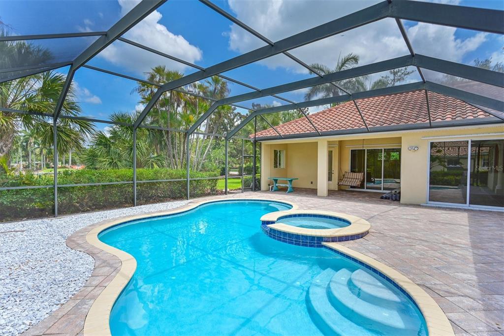 10622 Conch Shell Terrace Bradenton, FL 34212 - Photo 3 of 69 a view of a house with swimming pool