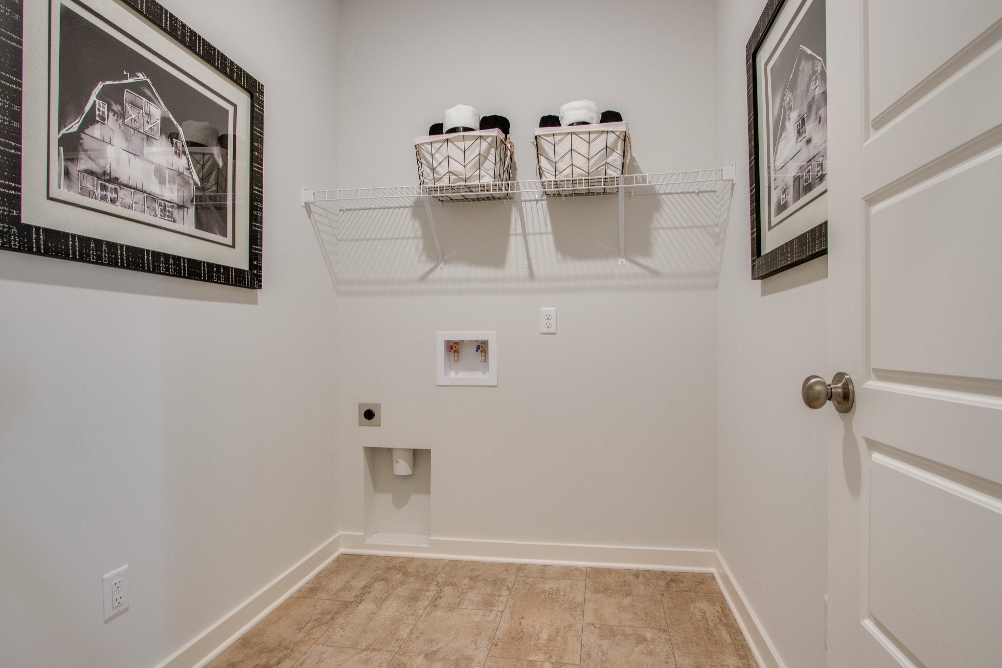 219 Goldfinch Road Mount Juliet, TN 37122 - Photo 16 of 23 a view of front door with racks on the wall