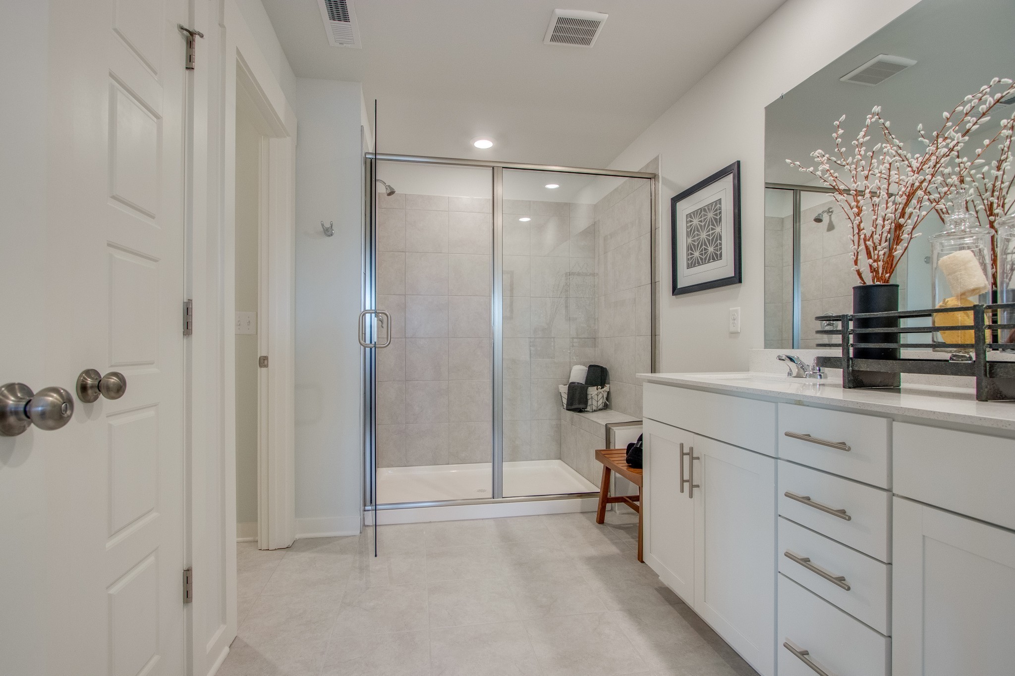 219 Goldfinch Road Mount Juliet, TN 37122 - Photo 23 of 23 a spacious bathroom with a mirror a double vanity sink and shower