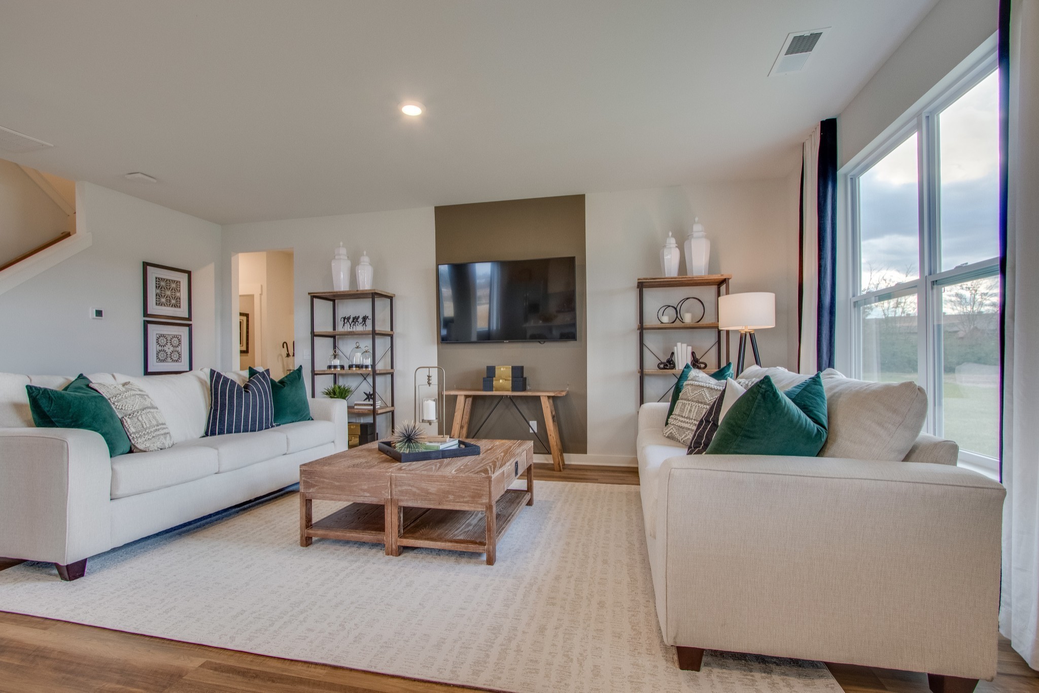 219 Goldfinch Road Mount Juliet, TN 37122 - Photo 3 of 23 a living room with furniture and a flat screen tv