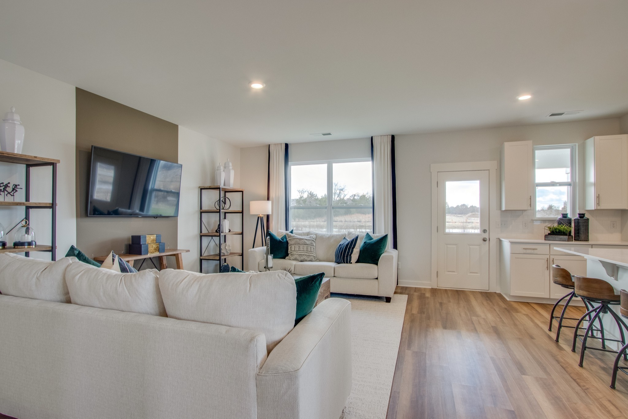 219 Goldfinch Road Mount Juliet, TN 37122 - Photo 7 of 23 a living room with furniture and a flat screen tv