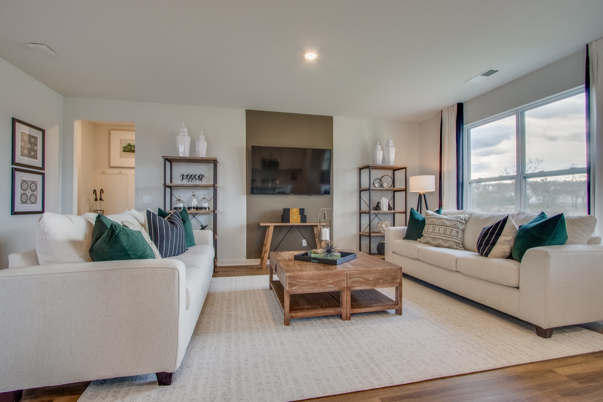 219 Goldfinch Road Mount Juliet, TN 37122 - Photo 8 of 23 a living room with furniture and a flat screen tv