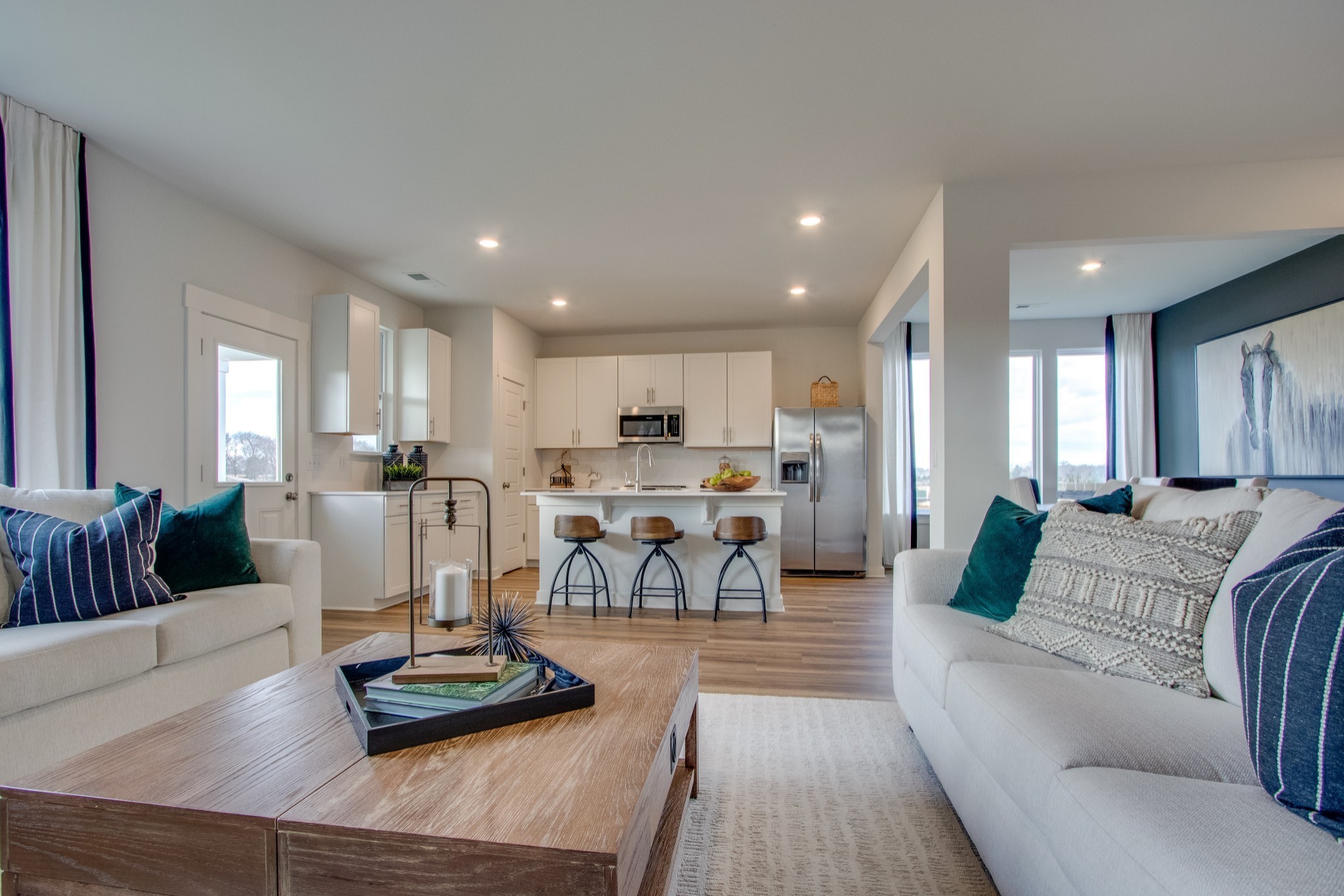 219 Goldfinch Road Mount Juliet, TN 37122 - Photo 10 of 23 a living room with furniture kitchen view and a large window