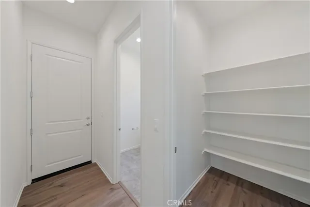 a view of an empty walk in closet