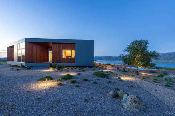 a view of a lake with mountains in the background