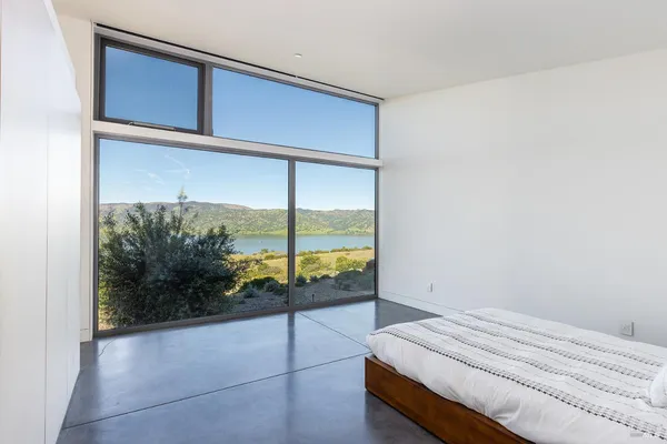 a view of an entryway with wooden floor and door