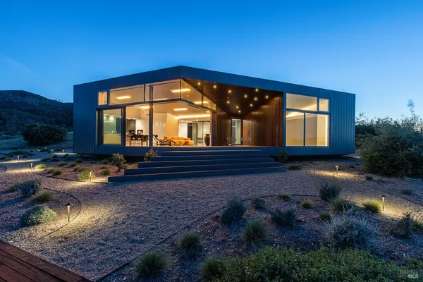a view of swimming pool having outdoor seating