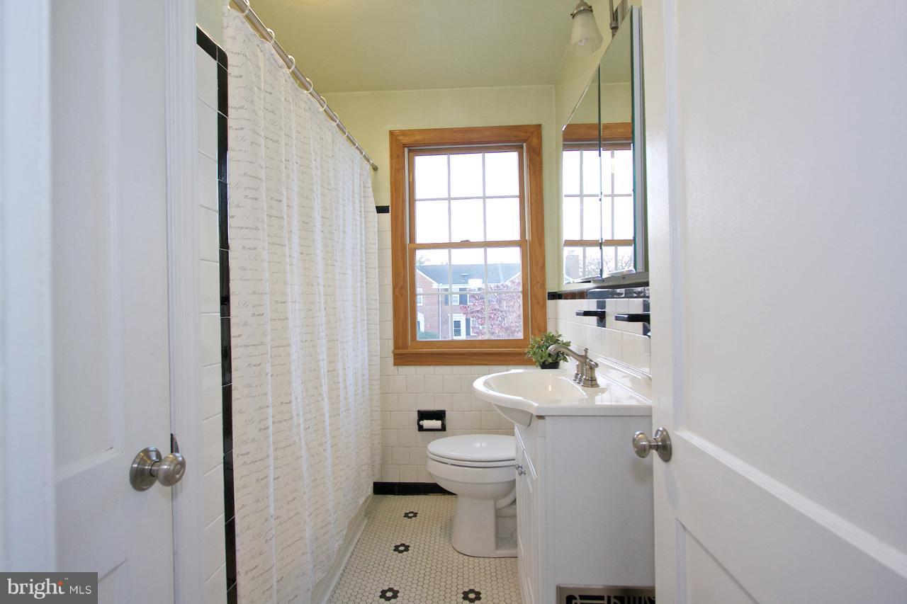 8213 Pleasant Plains Road Baltimore, MD 21286 - Photo 15 of 21 Bath with classic black & white tile