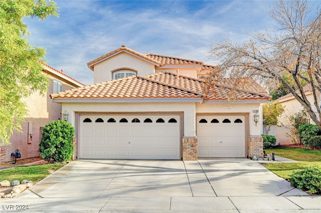 1708 Jack Rabbit Way Las Vegas, NV 89128 - Photo 1 of 16 Curb appeal, 3 car garage