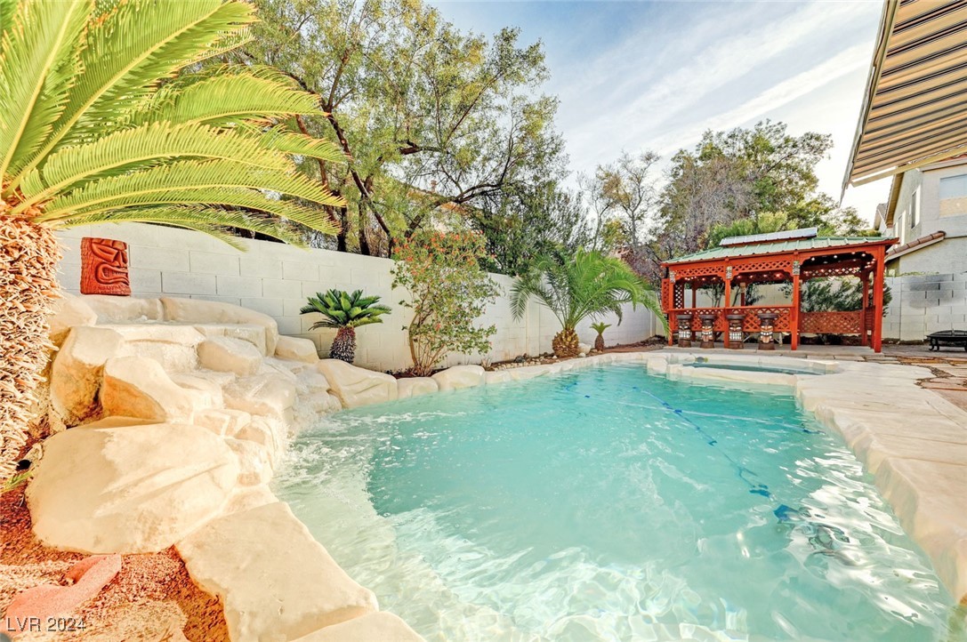 1708 Jack Rabbit Way Las Vegas, NV 89128 - Photo 2 of 16 Beautiful pool & spa with waterfall