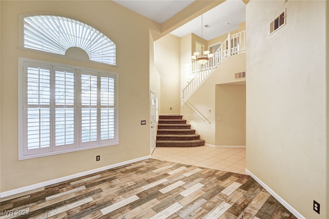 1708 Jack Rabbit Way Las Vegas, NV 89128 - Photo 3 of 16 Entry & living room with upgraded flooring!