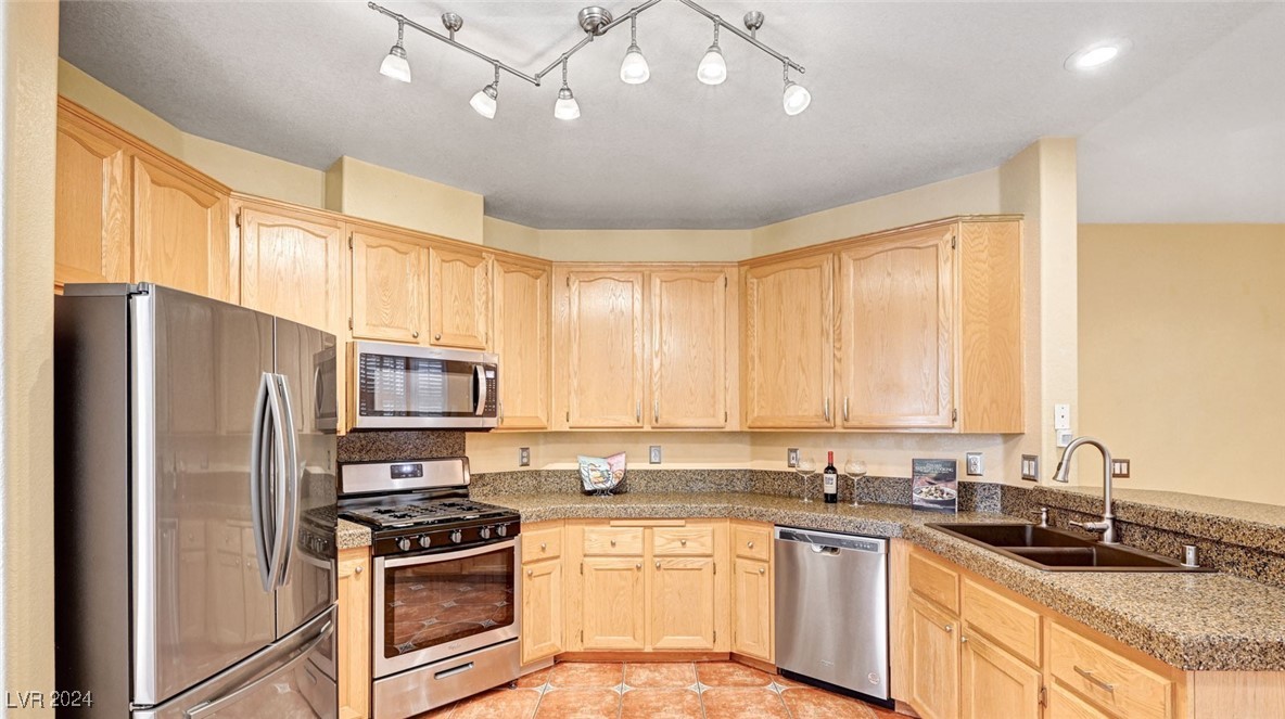 1708 Jack Rabbit Way Las Vegas, NV 89128 - Photo 6 of 16 Large kitchen with stainless steel appliances