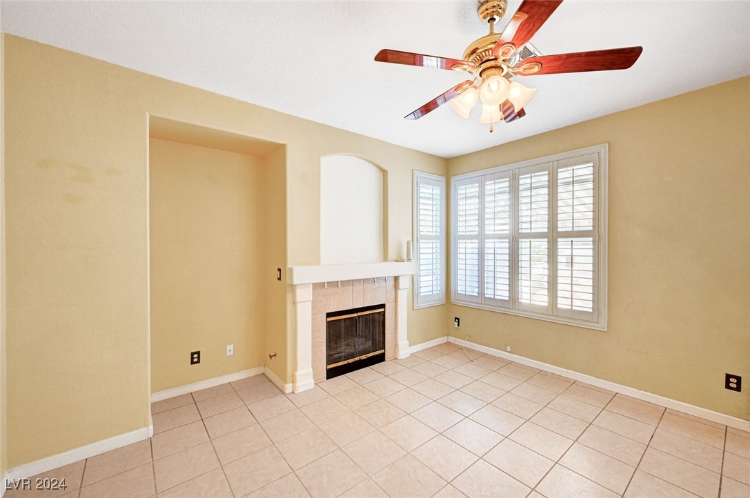 1708 Jack Rabbit Way Las Vegas, NV 89128 - Photo 8 of 16 Family room with cozy fireplace & pool view